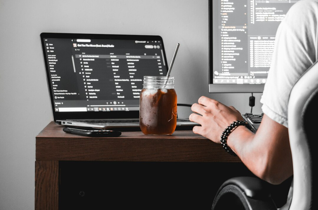 insurance coder at desk